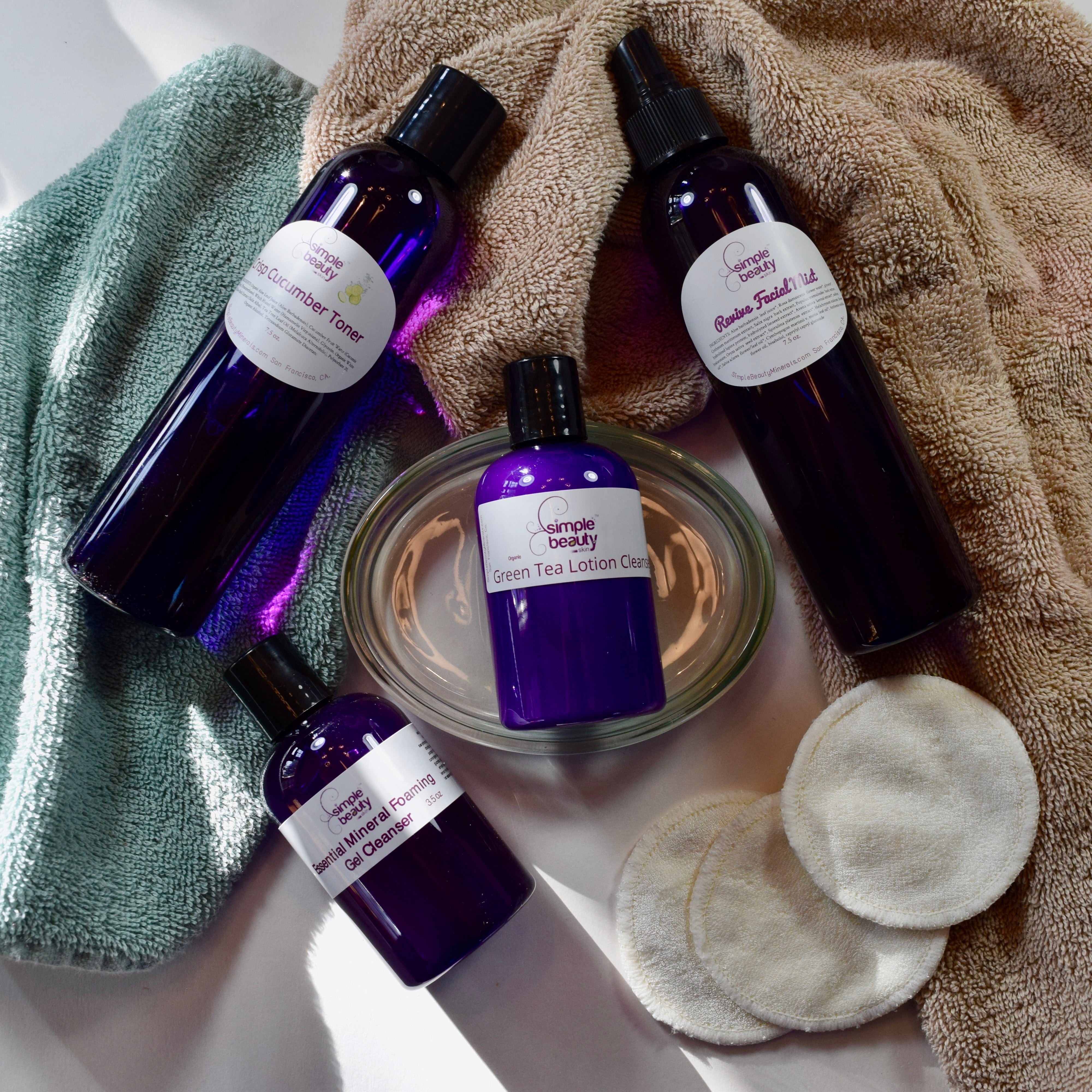 cleansers in purple bottles.
