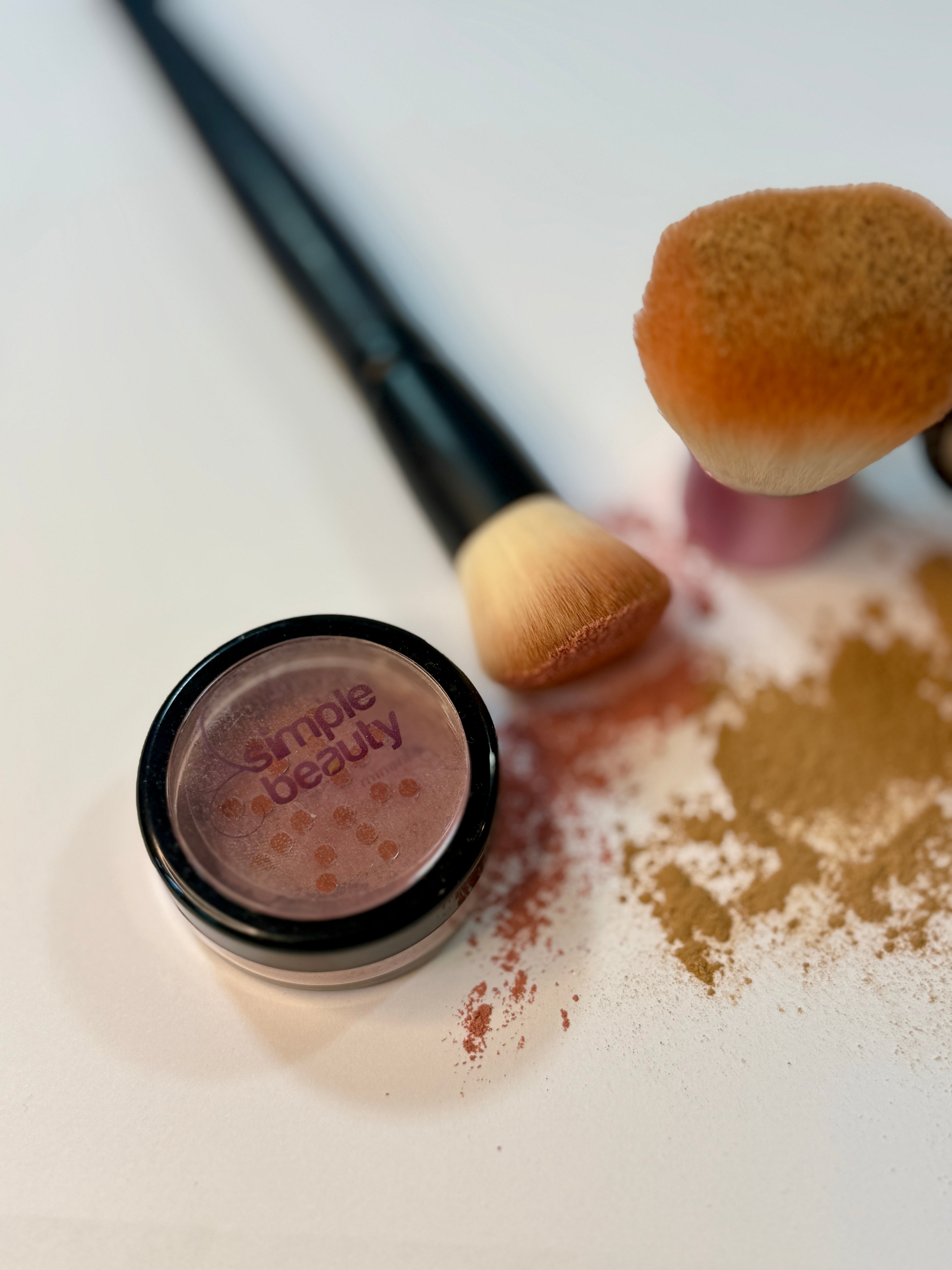 mineral powder makeup and brush.