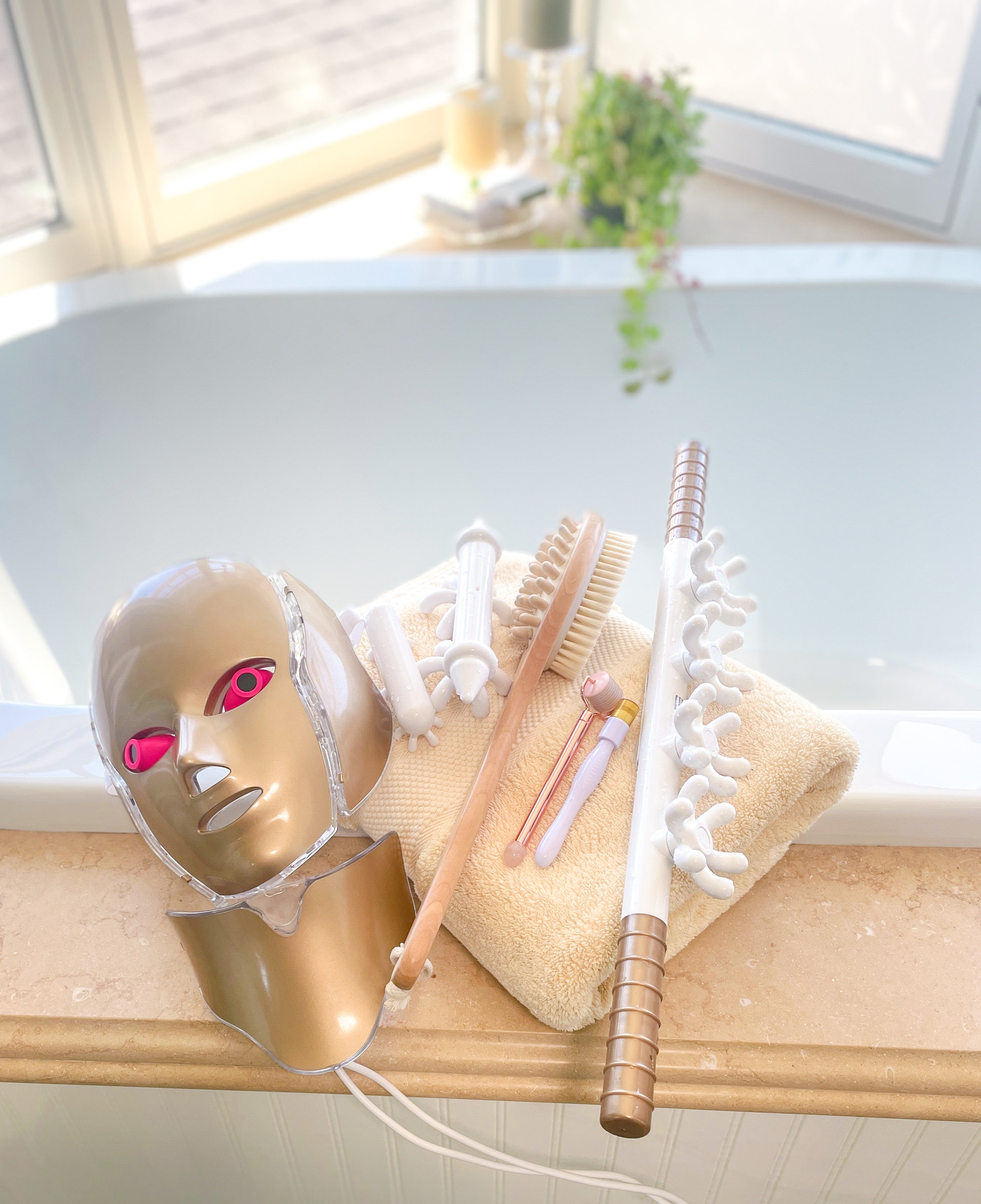 skincare beauty devices on bathtub.