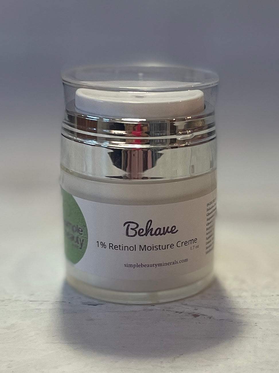 jar of behave retinoid cream on counter.