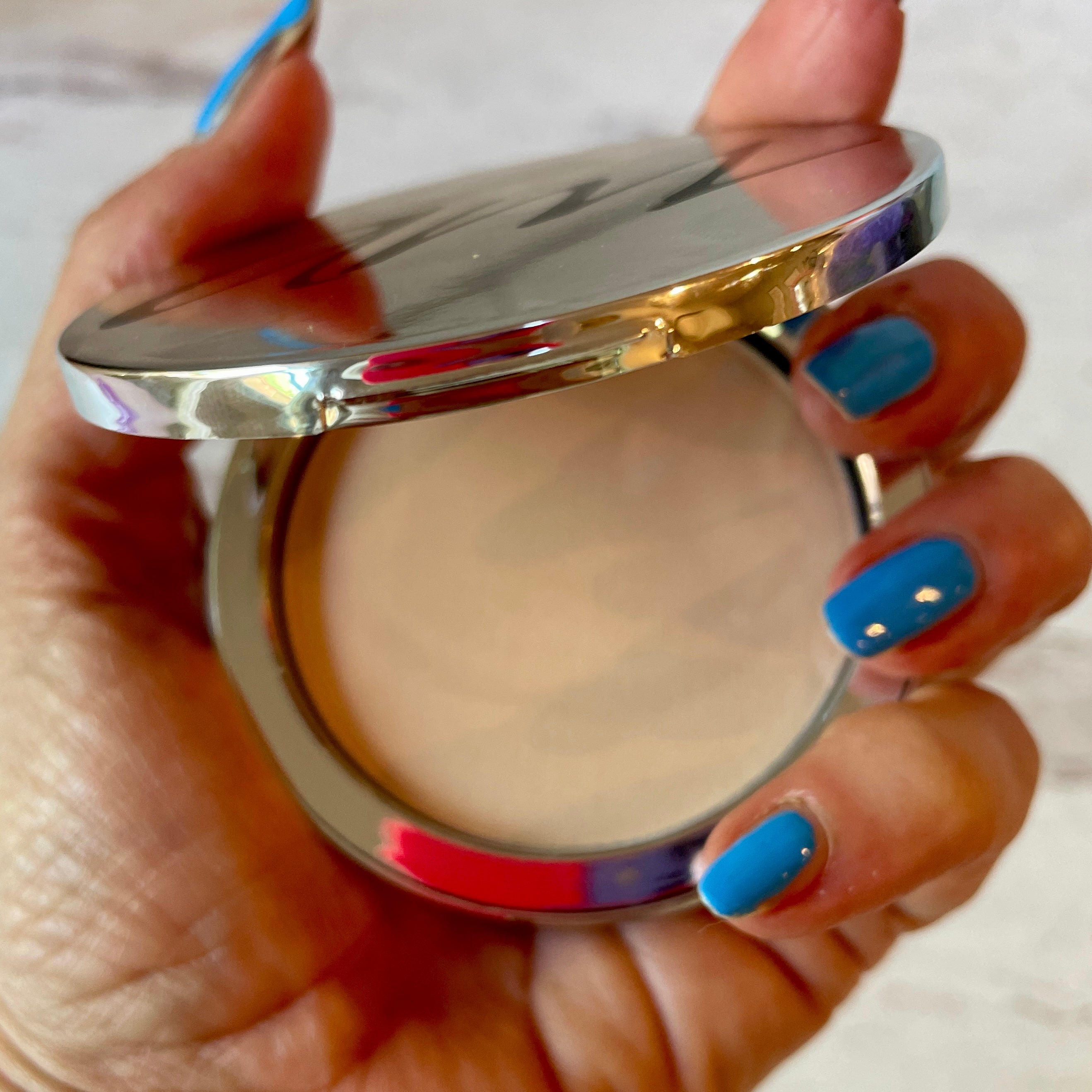 pure full coverage mineral foundation in hand