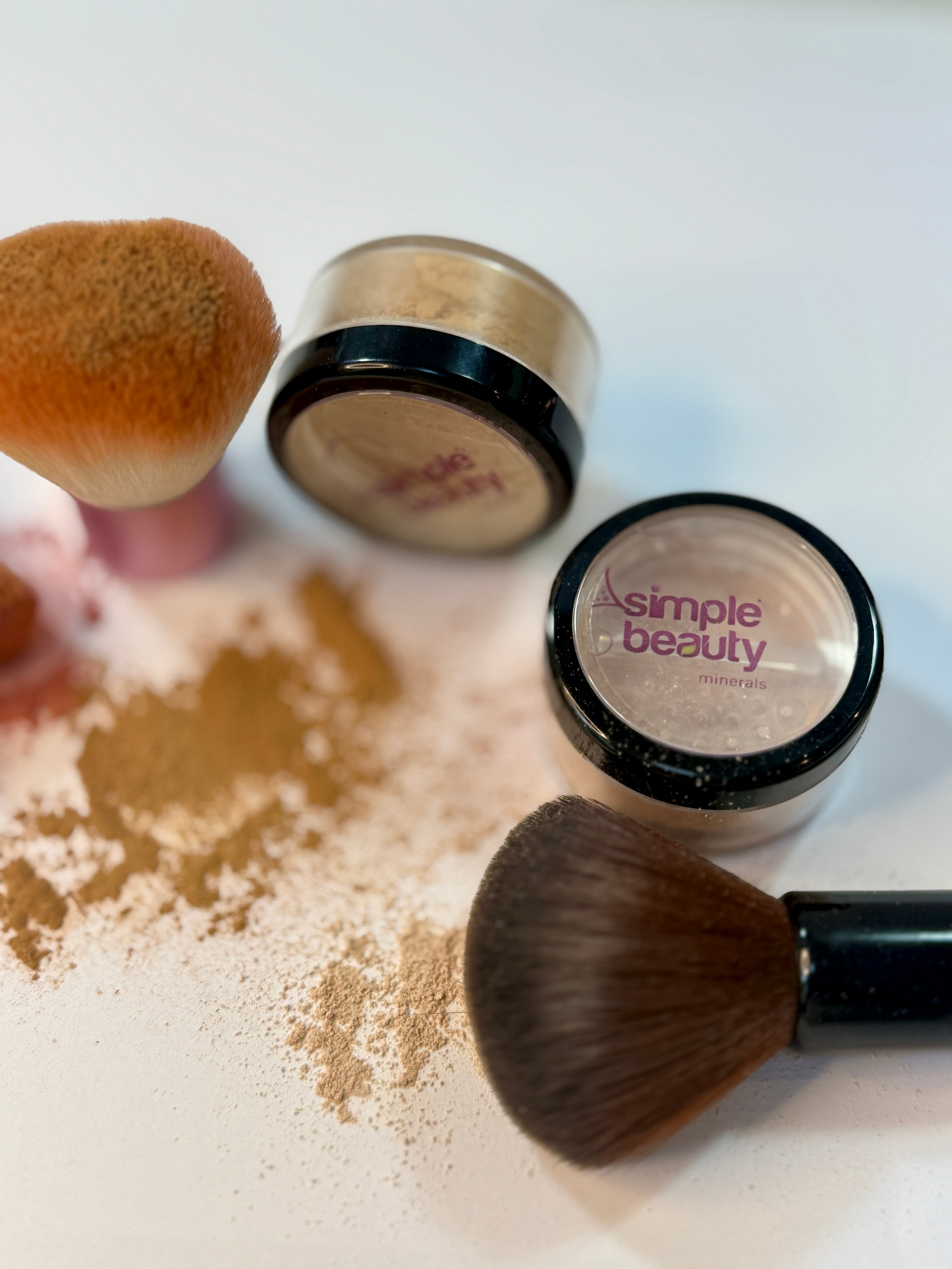 makeup brushes with sprinkles of mineral pigments.