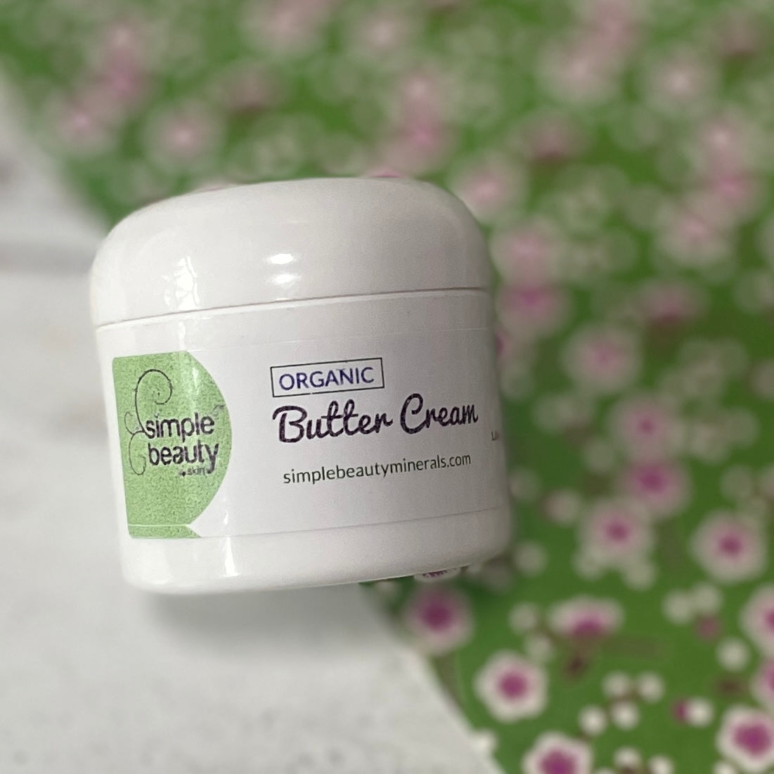 butter cream on floral print background.