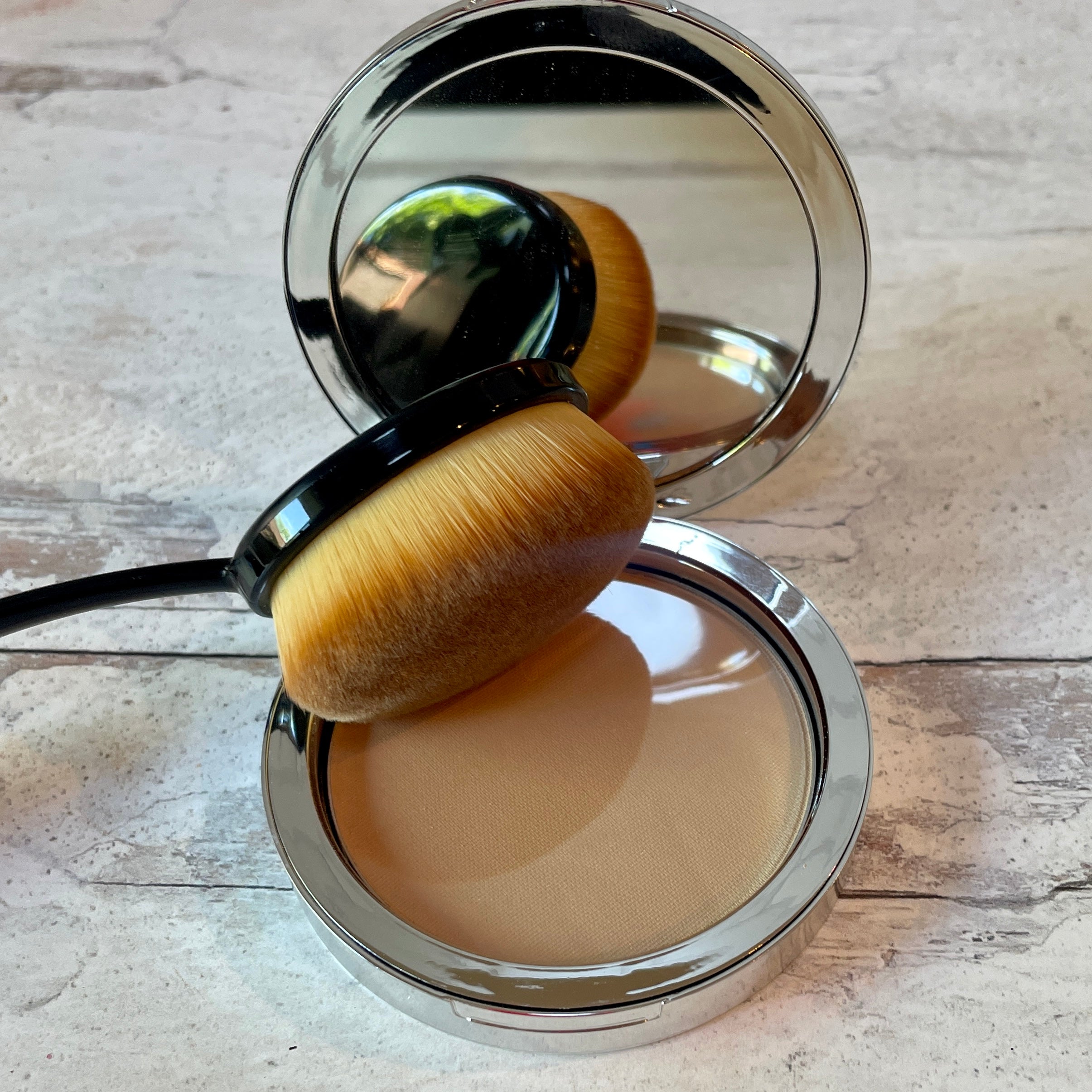pressed mineral powder foundation compact with vegan brush