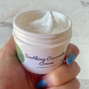 soothing ceramide cream open jar in hand