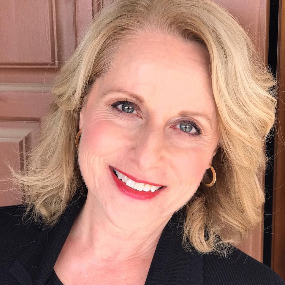 mature woman wearing scarlet lipstick