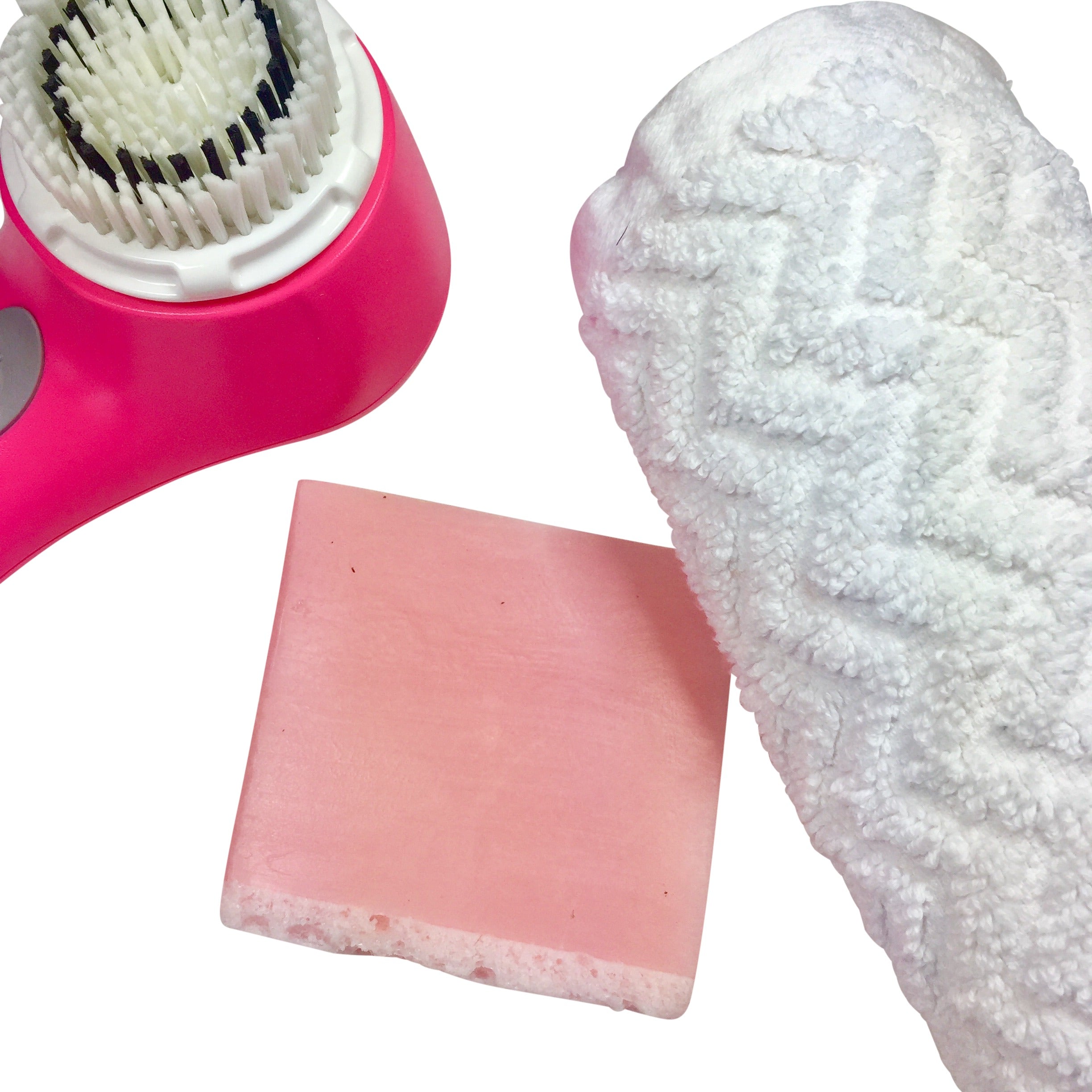 sonic cleanser, pink bar, white wash cloth