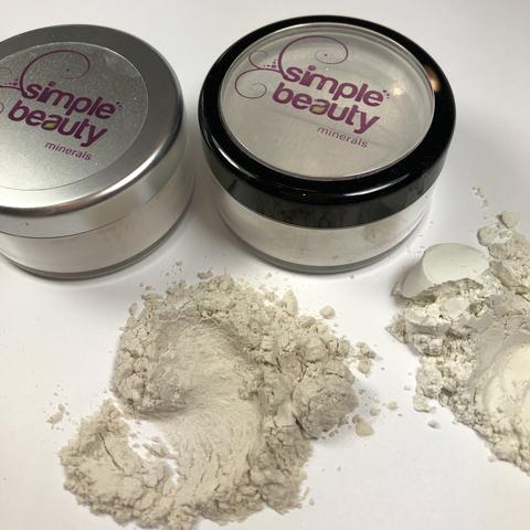 2 makeup jars with powder