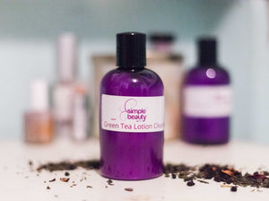 purple cleanser bottle with tea leaves 