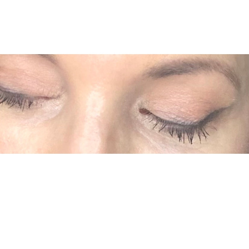 woman's eyes wearing almond eyeshadow and soft black eyeliner
