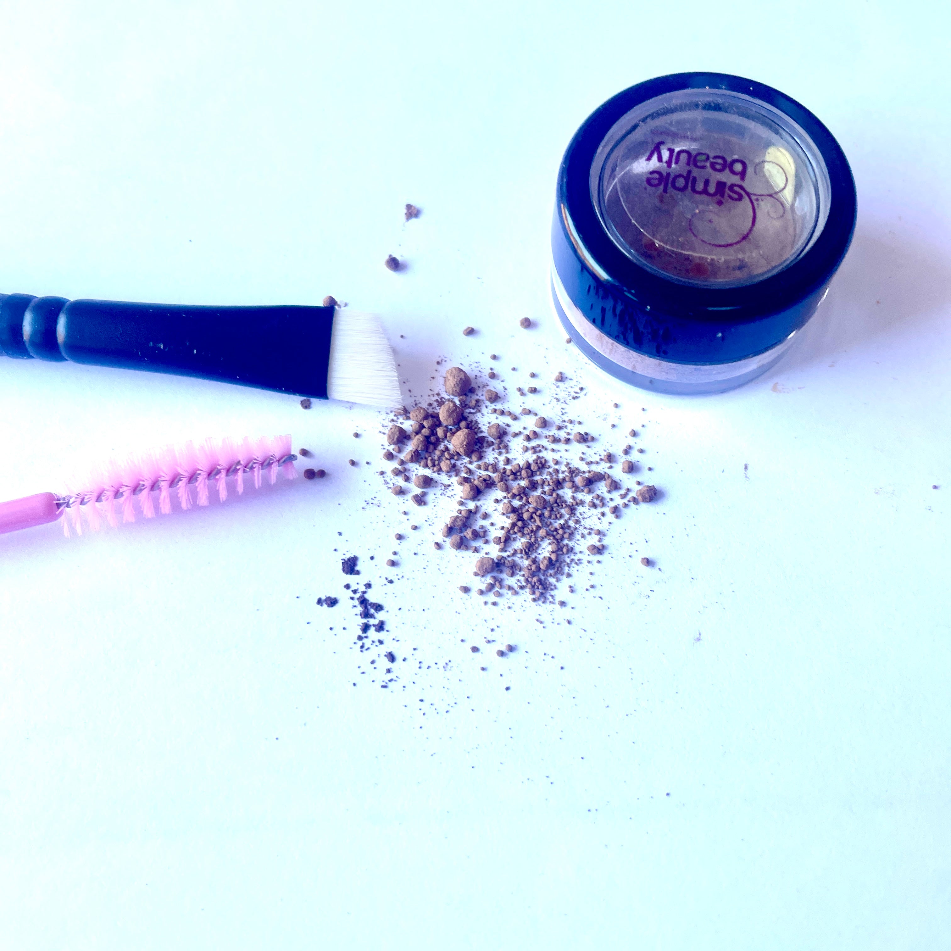 brow brush with spooly and brow powder