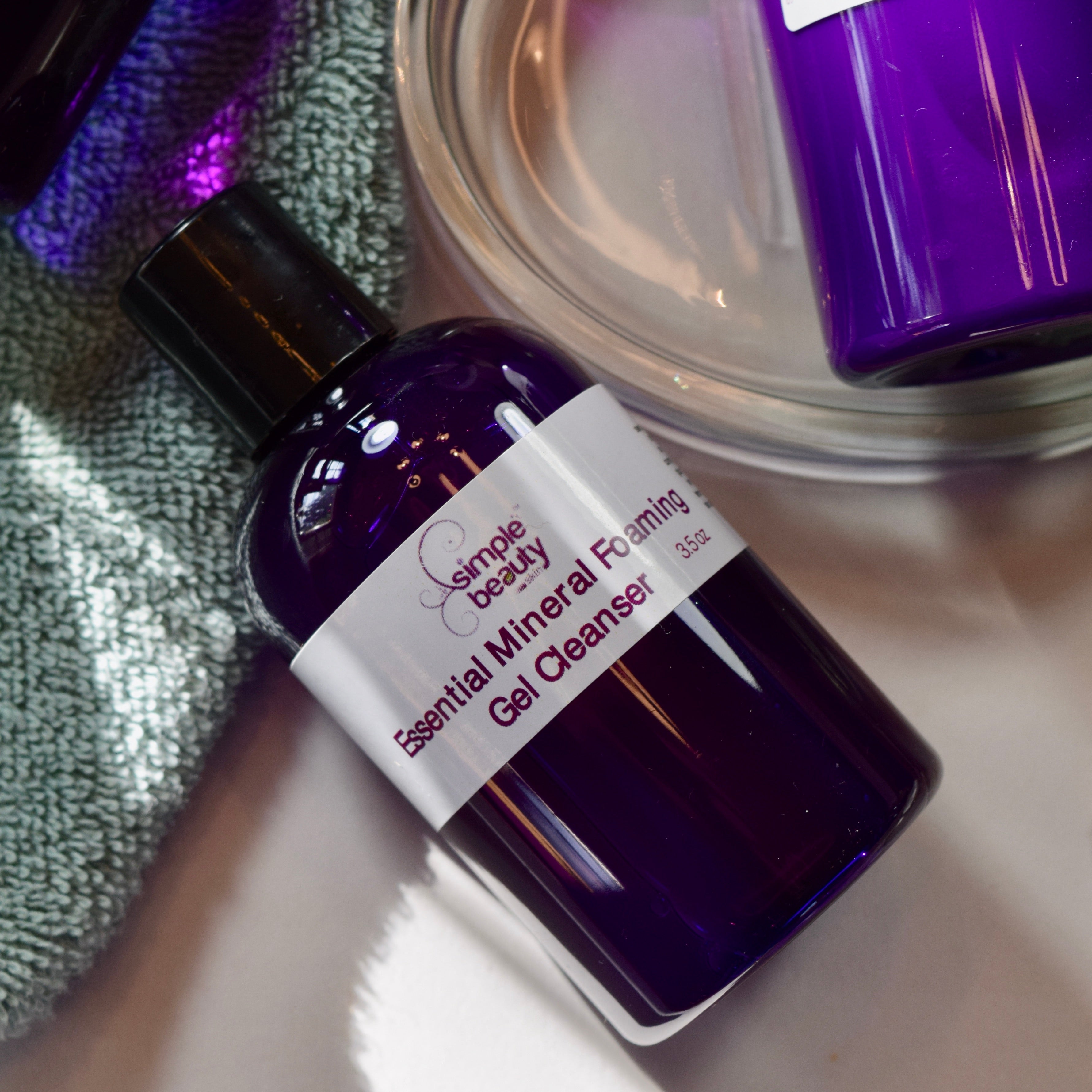 essential mineral gel cleanser on green washcloth
