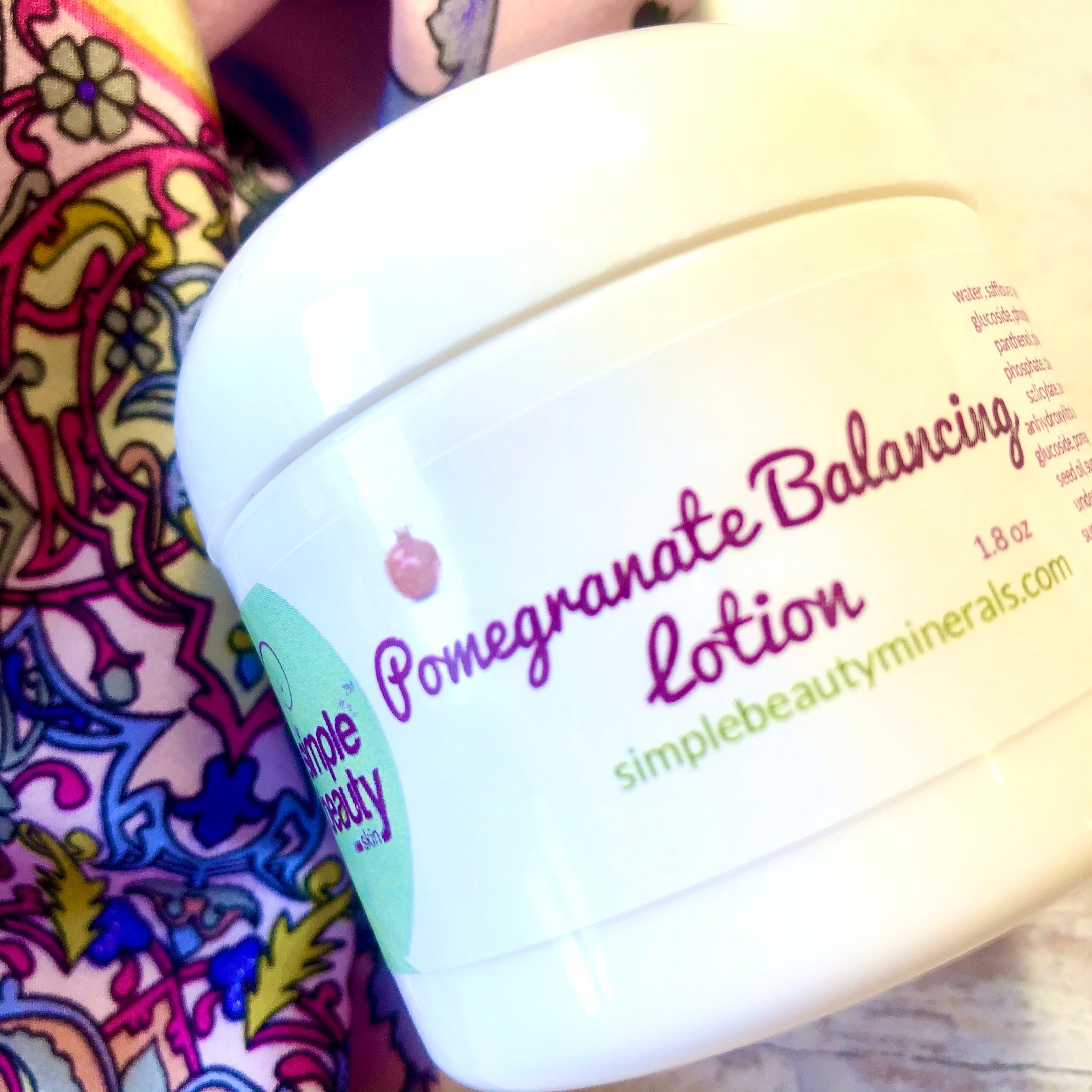 pomegranate lotion jar with scarf