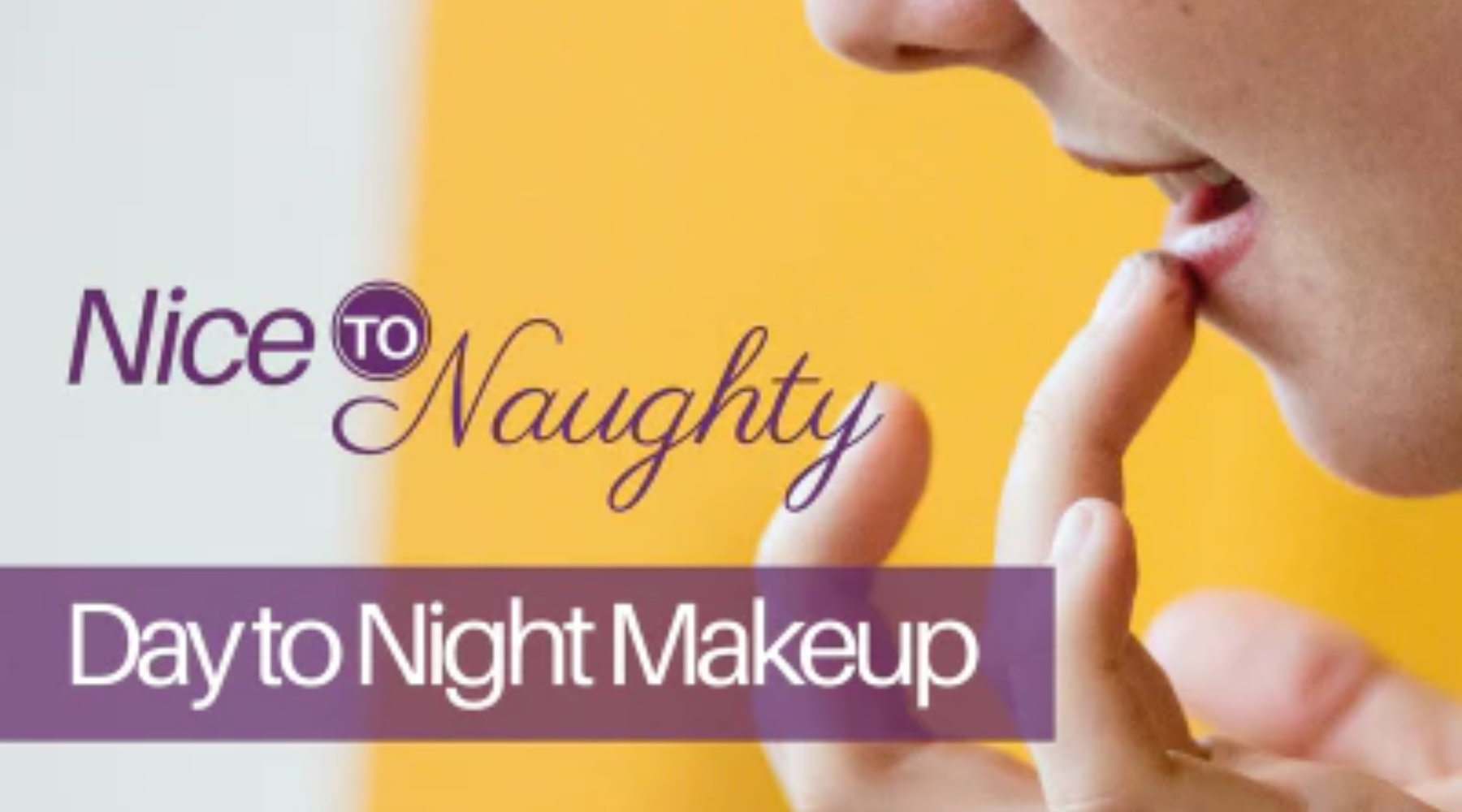 Woman applying lip color using her finger.
