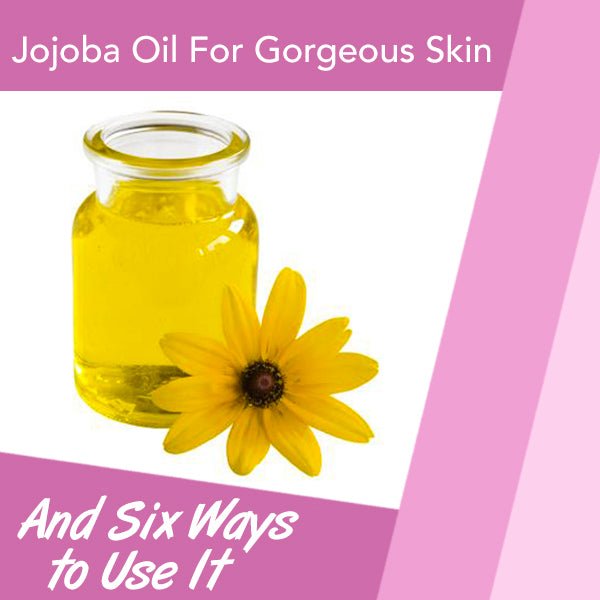 jojoba oil in glass jar with yellow flower - jojoba oil for gorgeous skin
