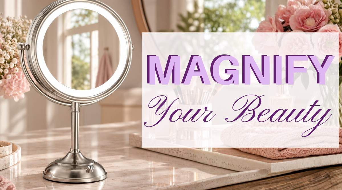 mirror on vanity with pink flowers and makeup brushes on the background.