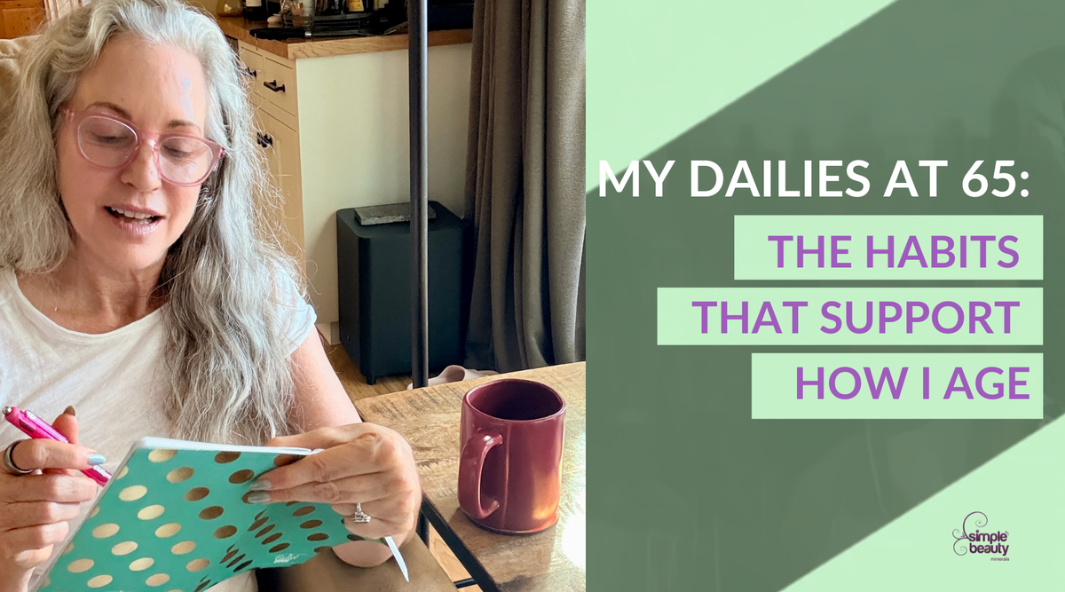silver hair woman writing in journal.