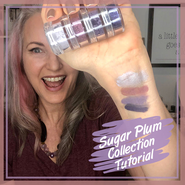 lisa holding sugar plum stacker with the colors swatched on wrist