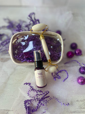 holiday gift set of serum and white jade roller