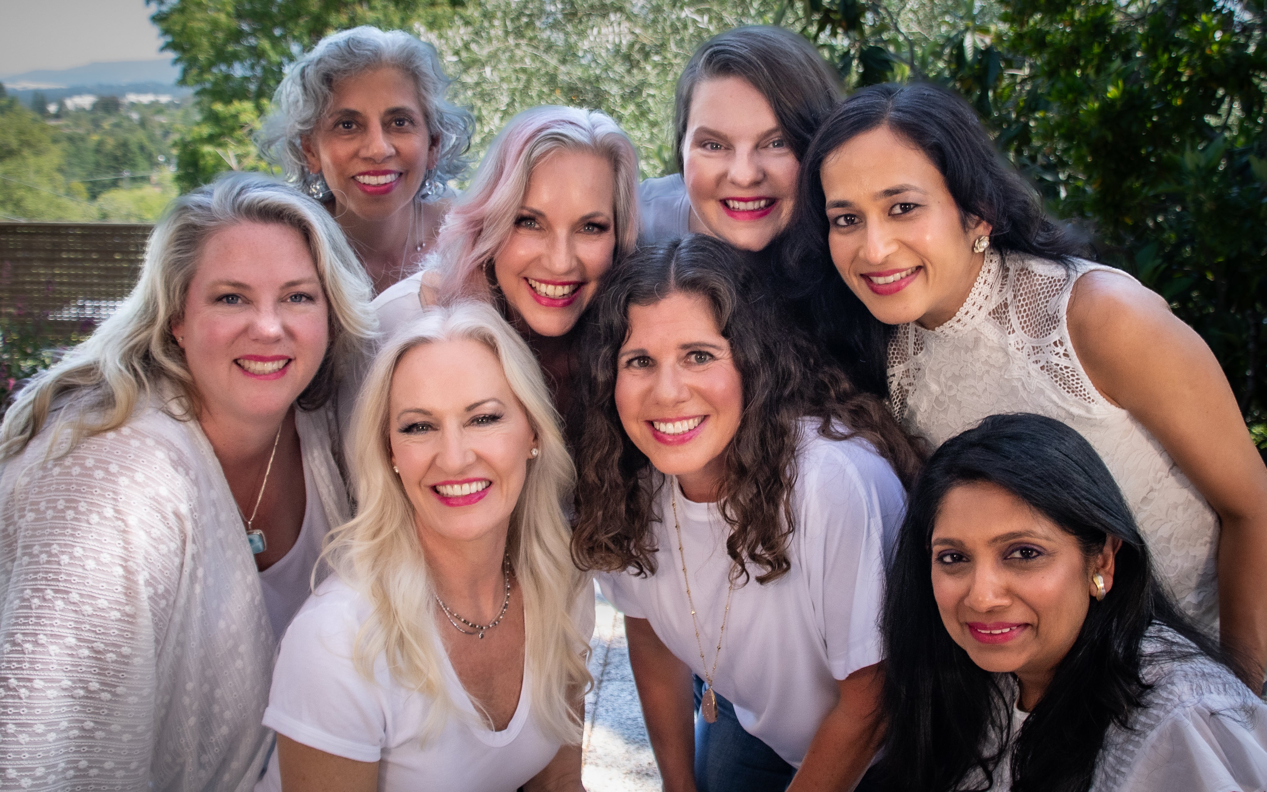 mature women smiling wearing white and pink lipstick