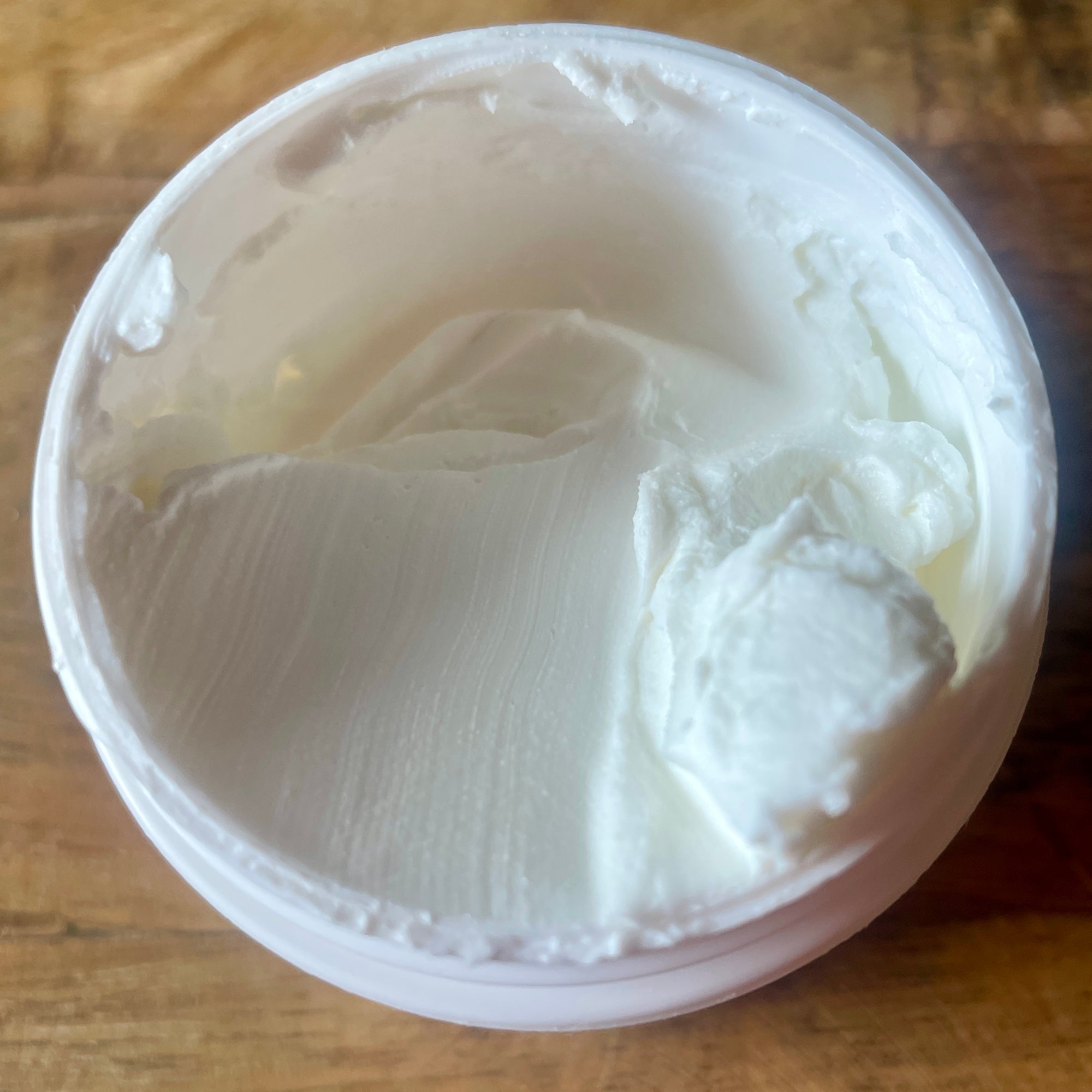 butter cream moisturizer jar.