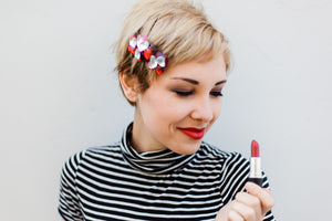 young woman wearing scarlet lip crayon