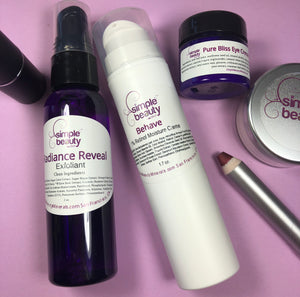 Behave moisture lotion surrounded by other beauty products on purple background