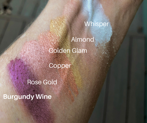 swatch of eyeshadows one of which is golden glam