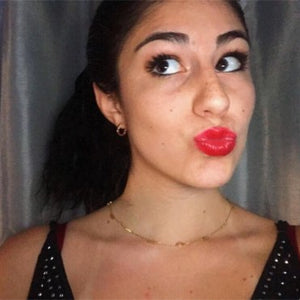 young woman wearing scarlet lip color