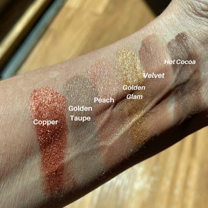 swatch of warm browns and copper eyeshadows