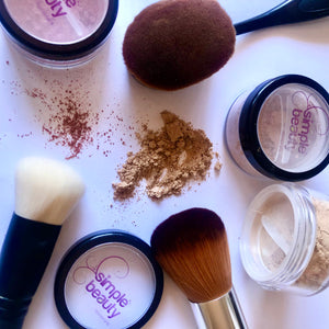 foundation powder, makeup jars, brushes