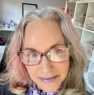 woman wearing moondust lavender lip color