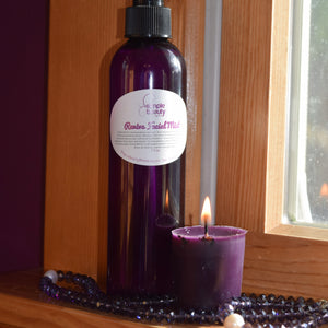 toner bottle purple on window sill with candle